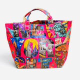 Hot pink NYC tote bag with colorful Statue of Liberty, skyline, subway, and Brooklyn Bridge collage.