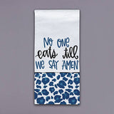 Tea towel with no one eats till we say amen phrase and blue abstract bottom design