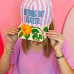 Purple striped baseball hat with floral bill and grateful embroidered message.