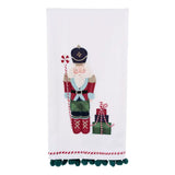 Embroidered nutcracker tea towel with candy cane staff and Christmas presents on soft cotton fabric.