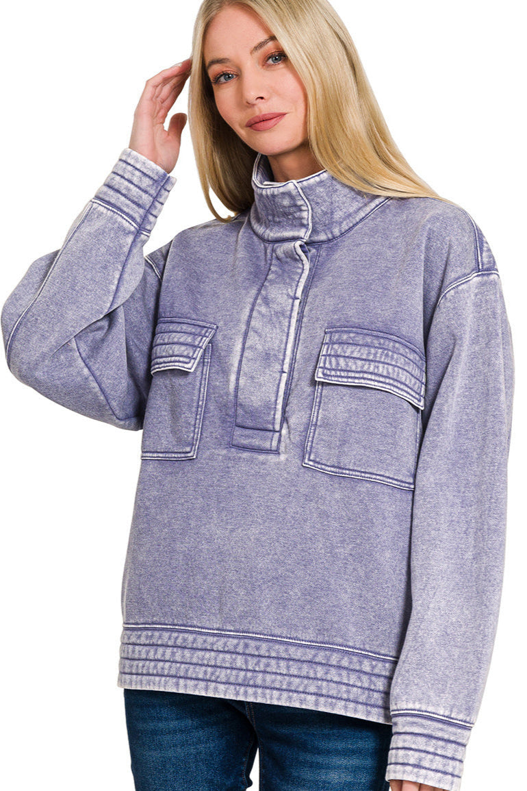 Marlin acid-washed half-snap fleece sweatshirt with button front and relaxed fit.