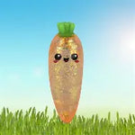 Orange carrot glitter squishy stress toy with sparkling sensory design.