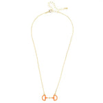 Gold horsebit necklace with orange enamel pendant on adjustable chain