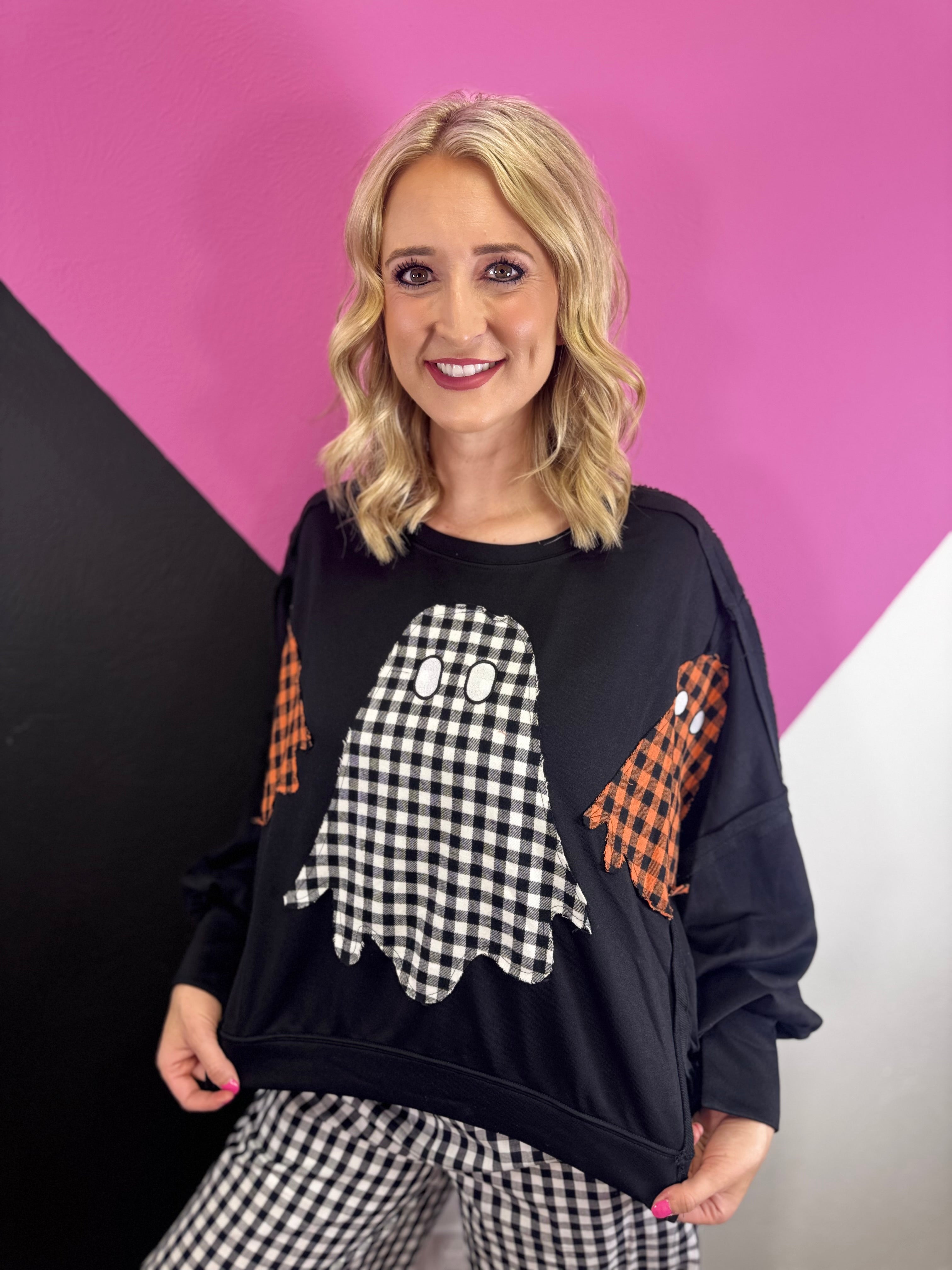Oversized Halloween sweatshirt with three plaid ghost appliqués and raw-edge details.