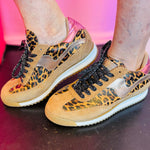 Leopard print sneakers with suede panels metallic accents and black laces retro style