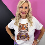 White tiger tee with layered jeweled necklace featuring purple and gold stones.