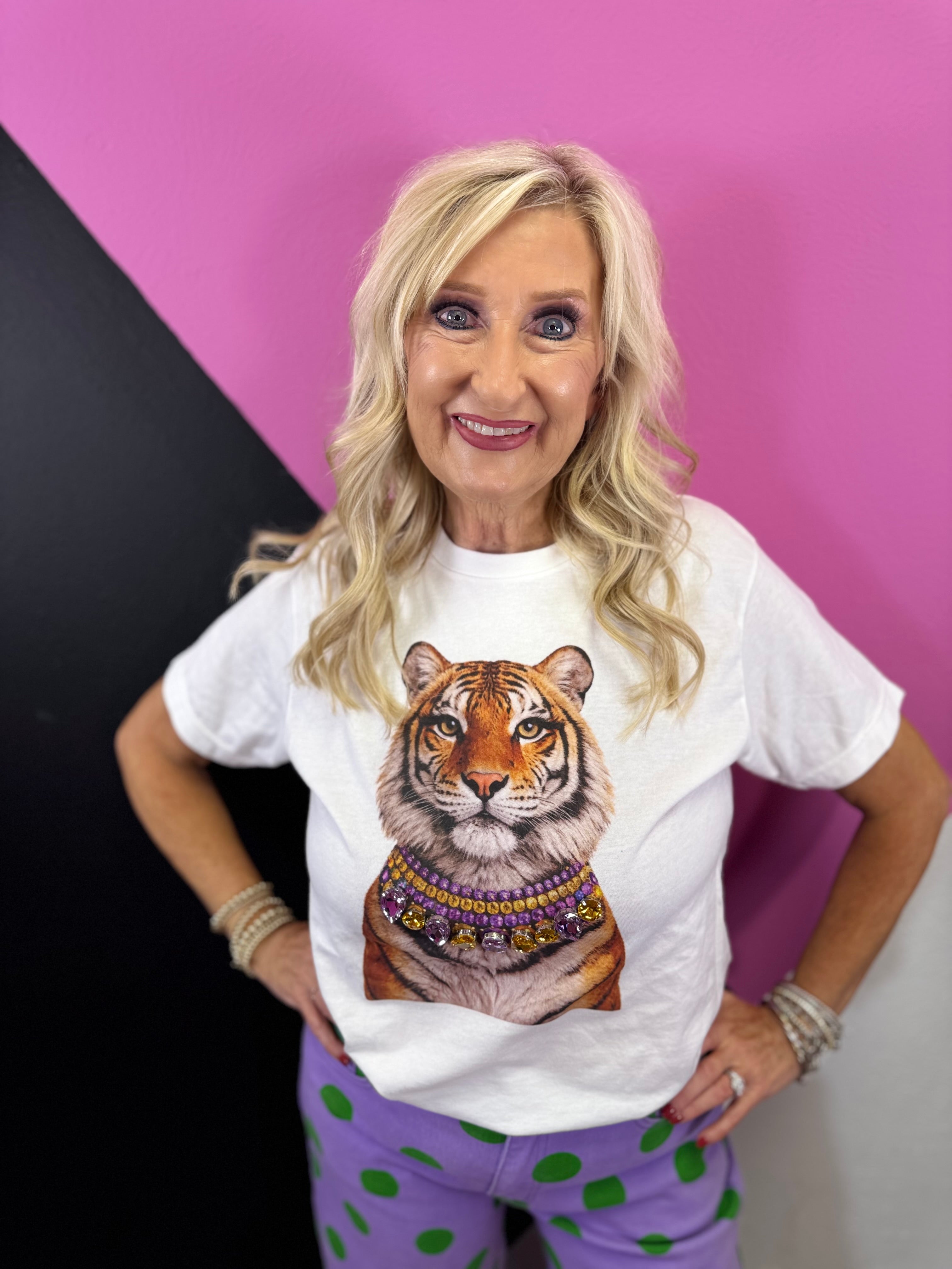 White tiger tee with layered jeweled necklace featuring purple and gold stones.