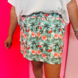 Palm Beach Flamingo Skort with flamingo and palm tree print, drawstring waistband, and built-in shorts.