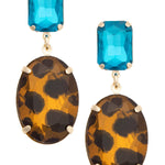 Teal crystal drop earrings with vibrant faceted light-catching stones.