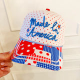 Patchwork Made In America hat with patriotic brim and embroidered icons.
