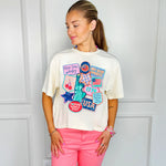 Cream cropped patriotic graphic tee with vintage USA patches, stars, flags, and retro Americana icons