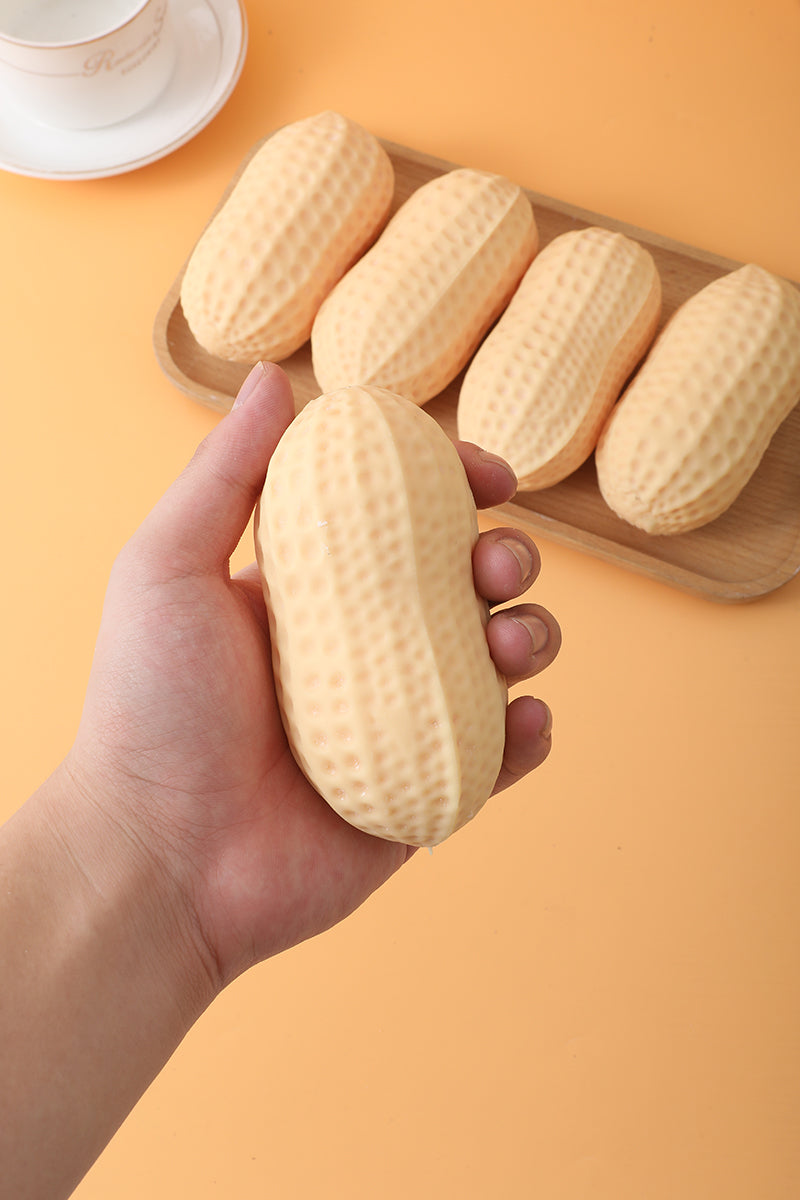 Peanut-shaped slow-rising squishy sensory toy.
