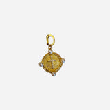 Gold tone cross medallion charm with crystal accents, pearl details, and polished gold clasp