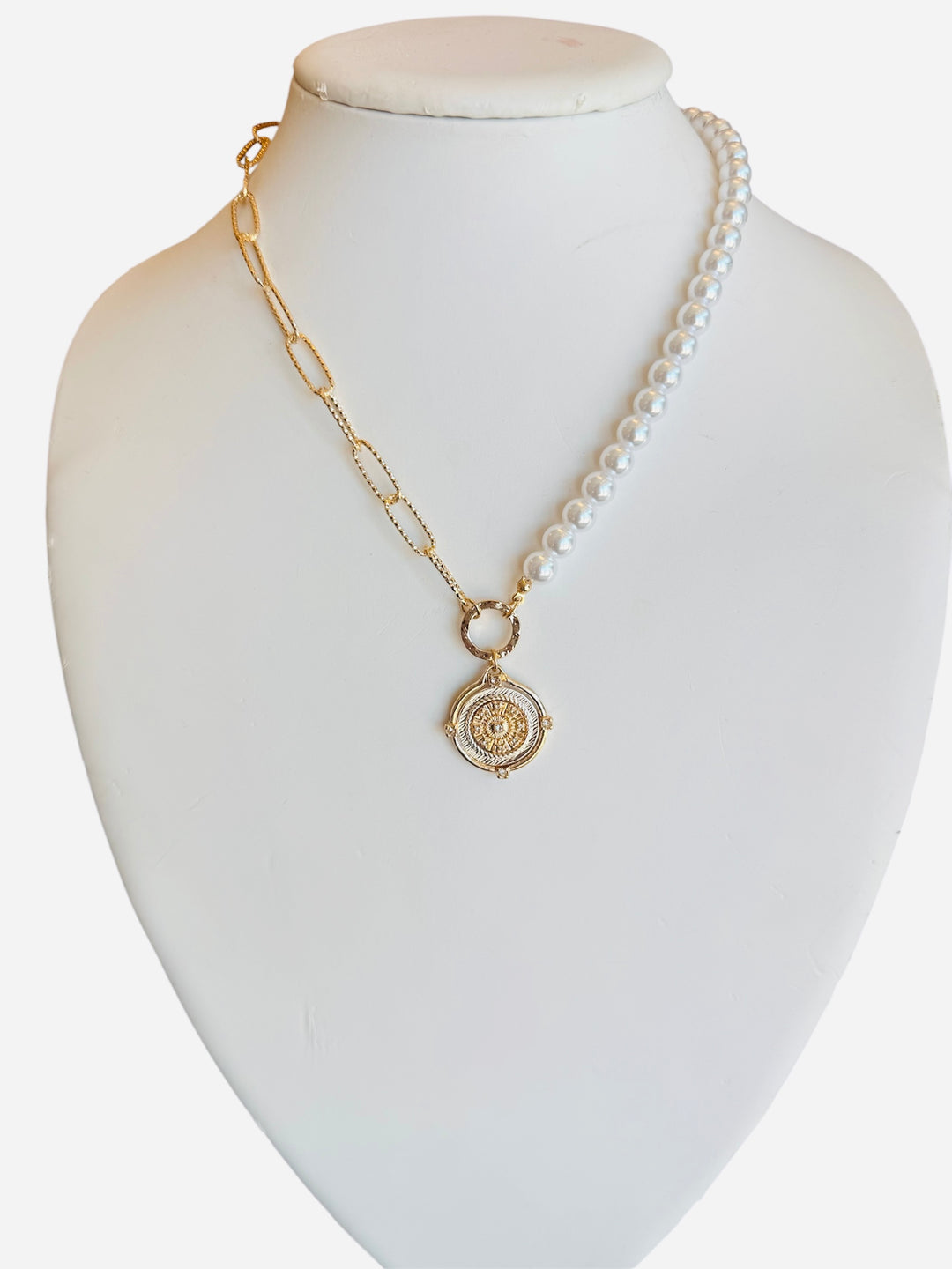 Half pearl, half gold chain necklace with gold pendant and sparkling crystal detail.