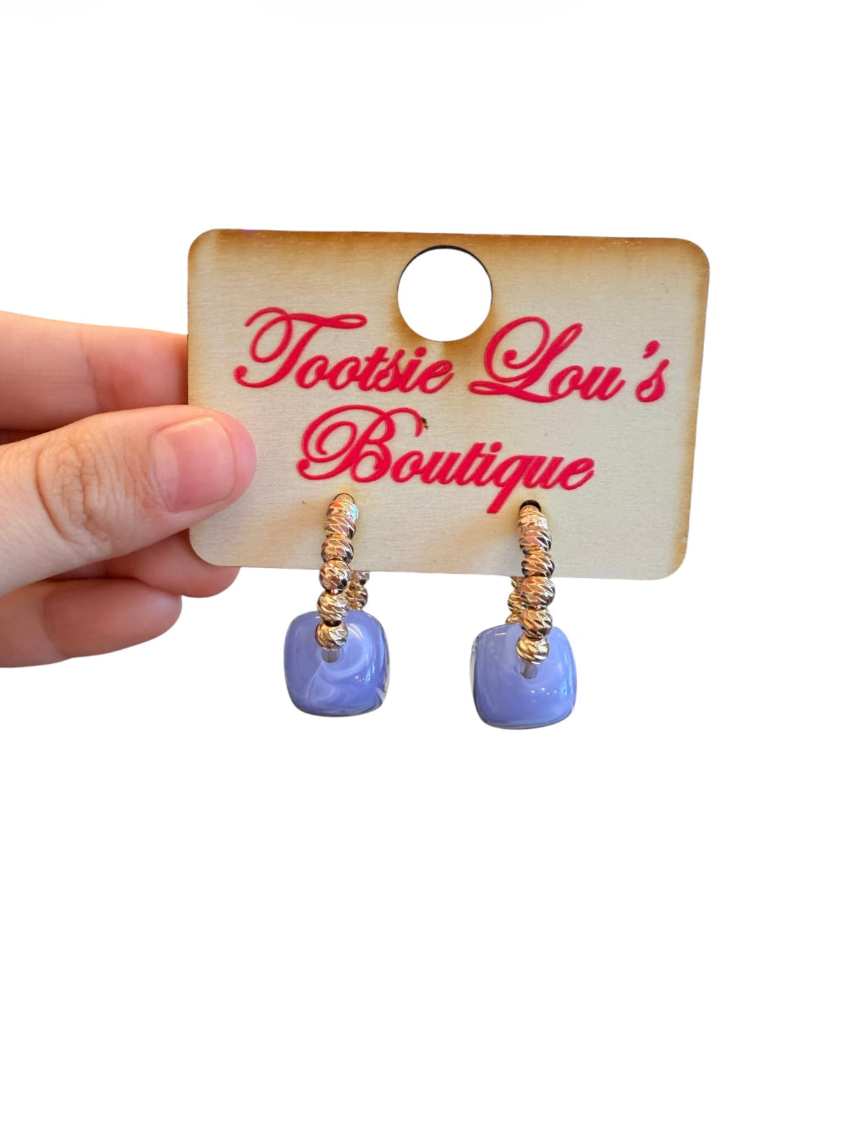 Gold beaded hoop earrings with glossy periwinkle blue resin cube accents.