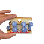 Periwinkle marbled bubble bracelet stack with oversized beads and gold spacers.