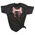 Black t-shirt with a sequin football and bow design on the front, laid flat to show sparkle and style.