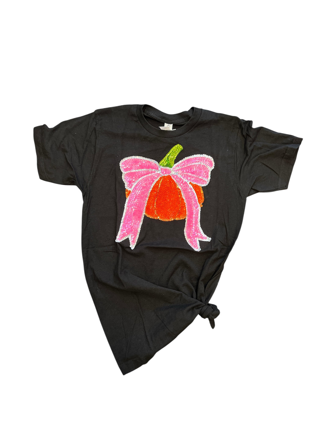 Black tee with sequin orange pumpkin graphic and bright pink sequin bow.