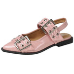 Pink pointed-toe flats with bold silver double buckle straps and a slingback backstrap, combining vibrant color with edgy charm.