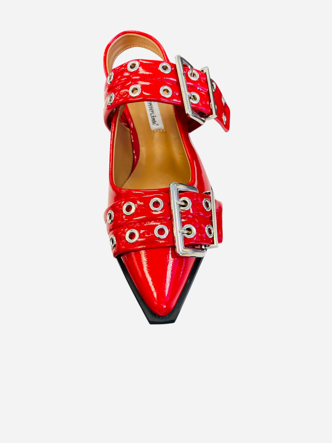 Red pointed-toe flats with bold silver double buckle straps and a slingback backstrap, combining vibrant color with edgy charm.