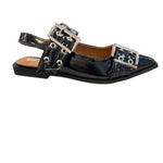 Black pointed-toe flats with bold silver double buckle straps and a slingback backstrap, combining vibrant color with edgy charm.