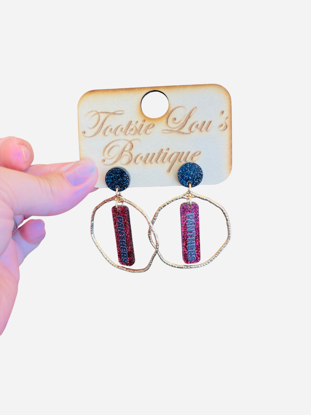 Maroon glitter dangle earrings with bold black PANTHERS lettering, gold circle frame, and black glitter stud top—perfect for game day team spirit