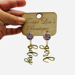 Festive Bday Girl dangle earrings with sparkly confetti stud and shiny gold script lettering.