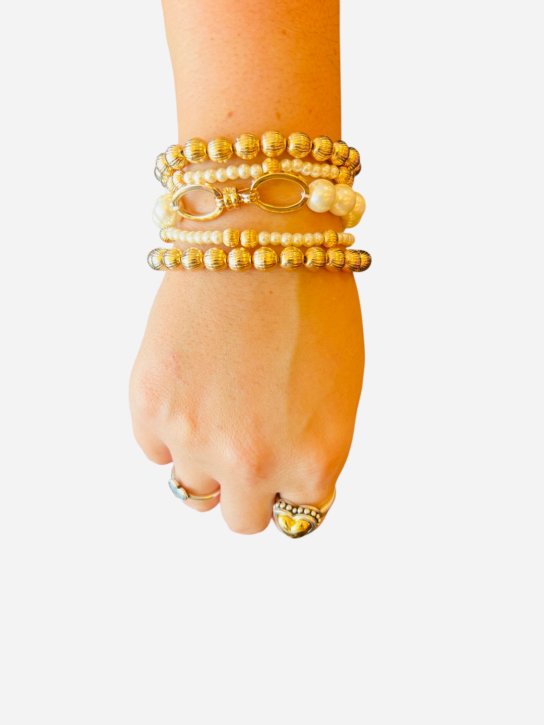 Set of 5 gold and pearl stretch bracelets — includes 2 gold textured 7mm, 2 pearl with gold accent, and 1 large pearl design, water-resistant.
