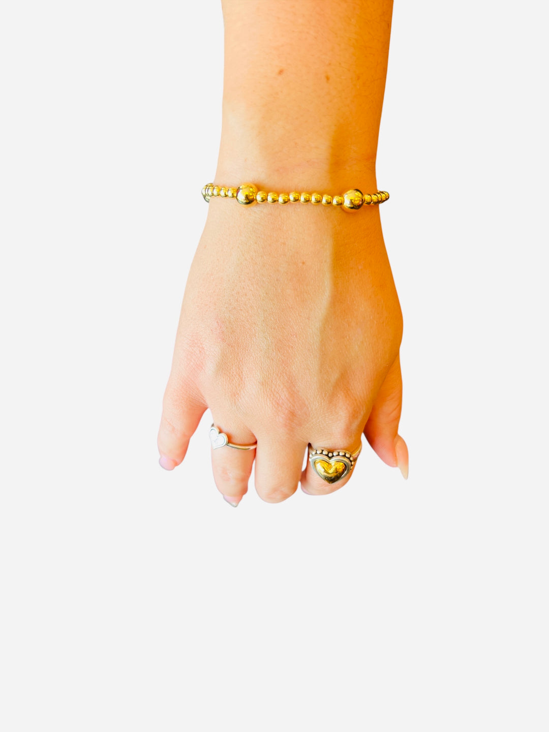 Waterproof stainless steel 4mm gold beaded bracelet with 8mm gold bead accent.
