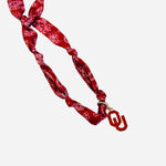 A bandana scarf-style necklace featuring the Oklahoma Sooners "OU" logo charm at the center.