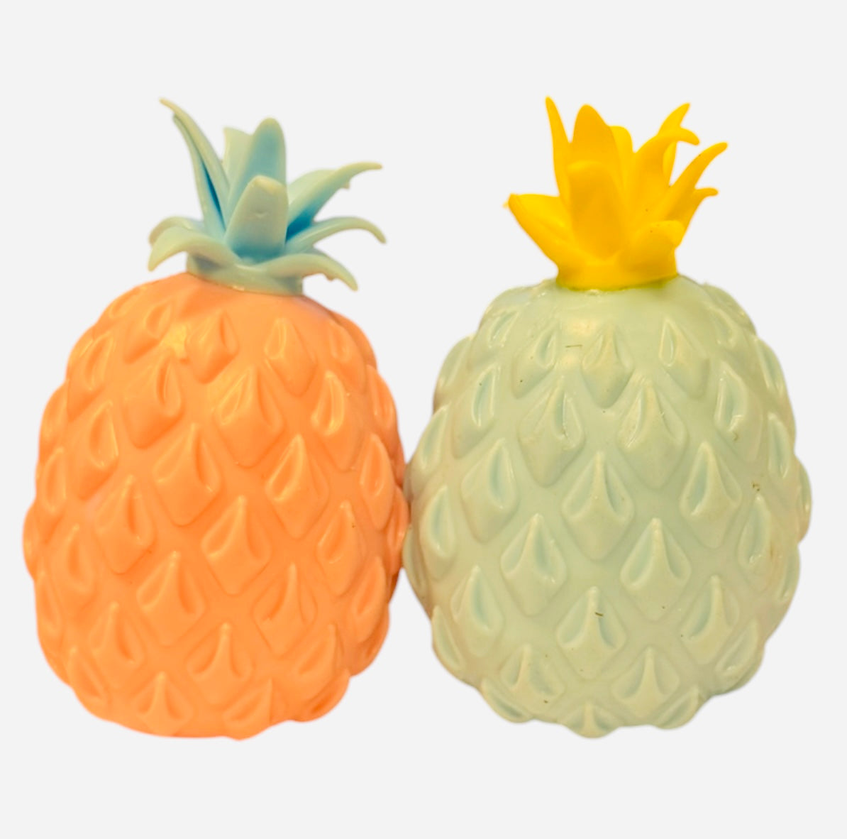 Pineapple-shaped squishy stress toy with soft sensory texture.