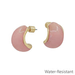 Pink acrylic gold .5 inch water resistant earrings with lightweight polished finish.