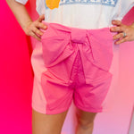 Pink shorts with oversized bow in the front