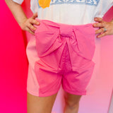Pink shorts with oversized bow in the front