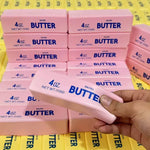 Pink butter-shaped squishy stress toy with soft sensory texture.