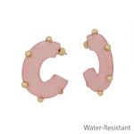 Pink gold studded hoop earrings, water resistant and lightweight.