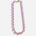 Pink crystal necklace with faceted rectangular stones and shimmering iridescent finish.