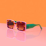 Pink leopard rectangle sunglasses by Tribe + Temple with UV400 protection and  resin frame design.