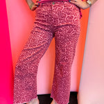 Pink leopard wide-leg high-waisted jeans with frayed hem and bold boutique-style print