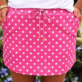 Pink polka dot skort with built-in shorts, elastic waistband, and side pockets.
