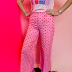 Pink polka dot wide leg jeans with pockets and relaxed fit