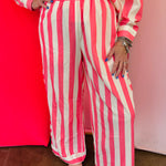 Pink striped wide leg lounge pants with contrast side panels.