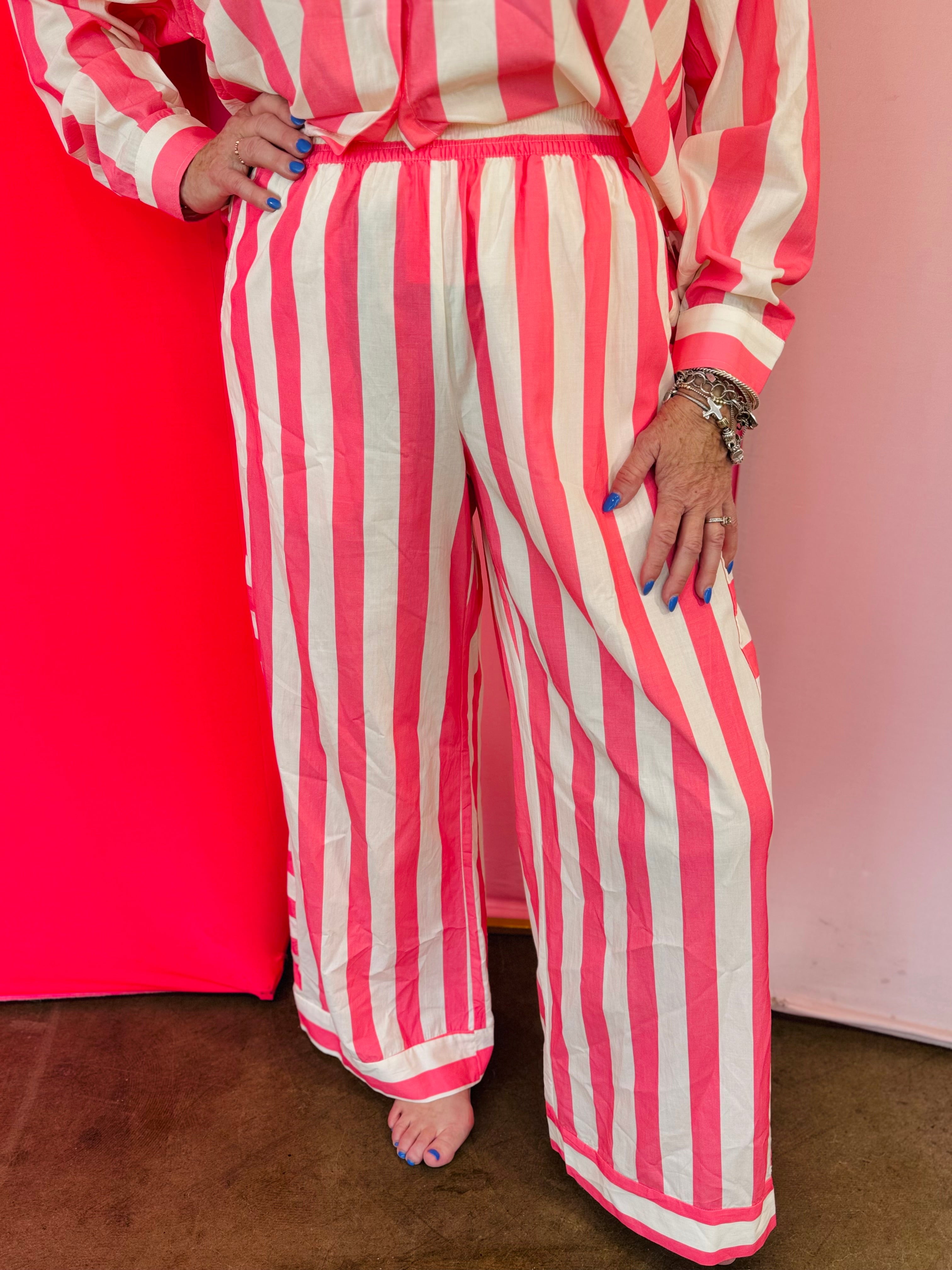 Pink striped wide leg lounge pants with contrast side panels.