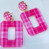 Hot pink plaid acrylic dangle earrings with polka dot stud.
