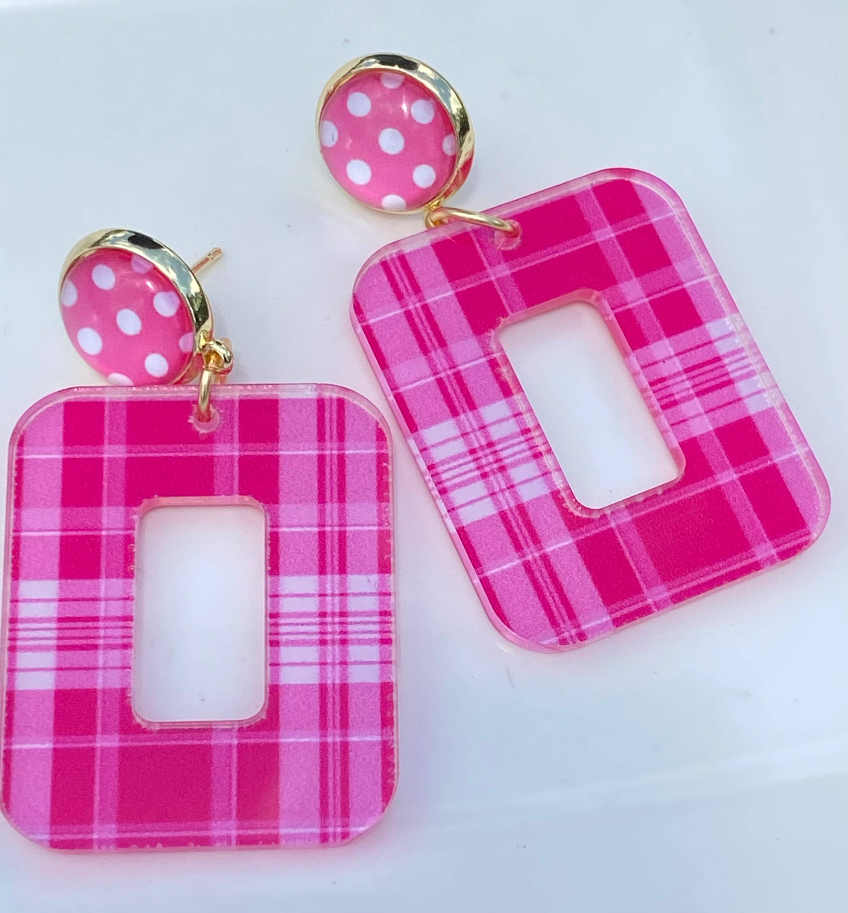 Hot pink plaid acrylic dangle earrings with polka dot stud.