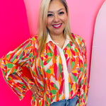 Colorful pleated floral top with flare sleeves and relaxed fit
