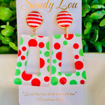 Red and green polka dot Christmas acrylic earrings with striped stud tops.