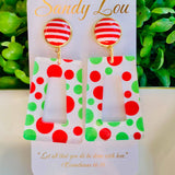 Red and green polka dot Christmas acrylic earrings with striped stud tops.