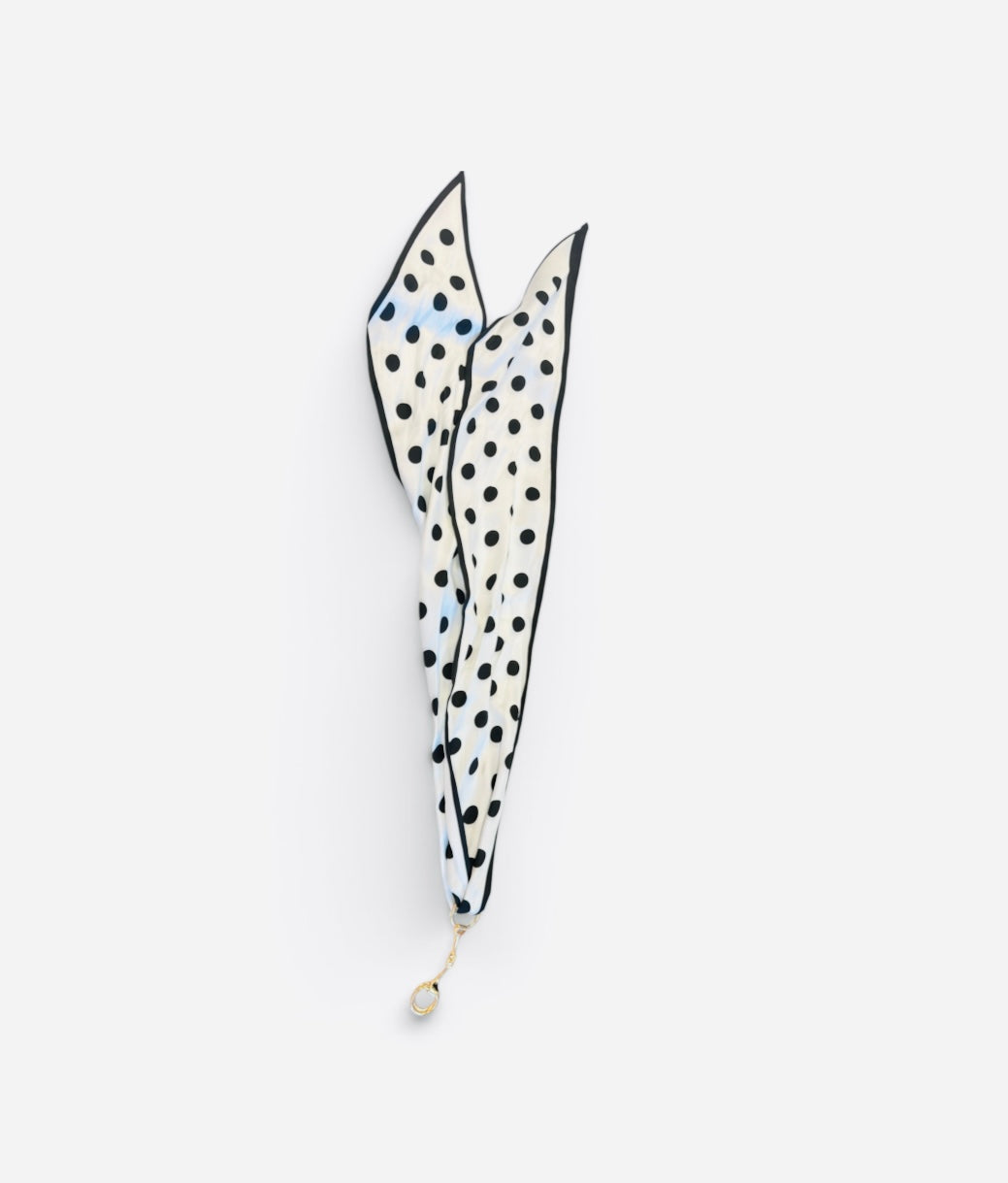Silky cream-white scarf with black polka dots and horsebit-inspired border.