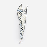 Silky cream-white scarf with black polka dots and horsebit-inspired border.